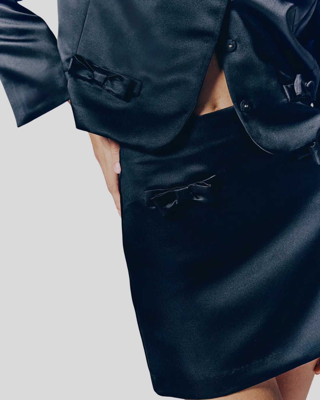 Black A-Line Mini Skirt with Front Bow Detailing | Chic India